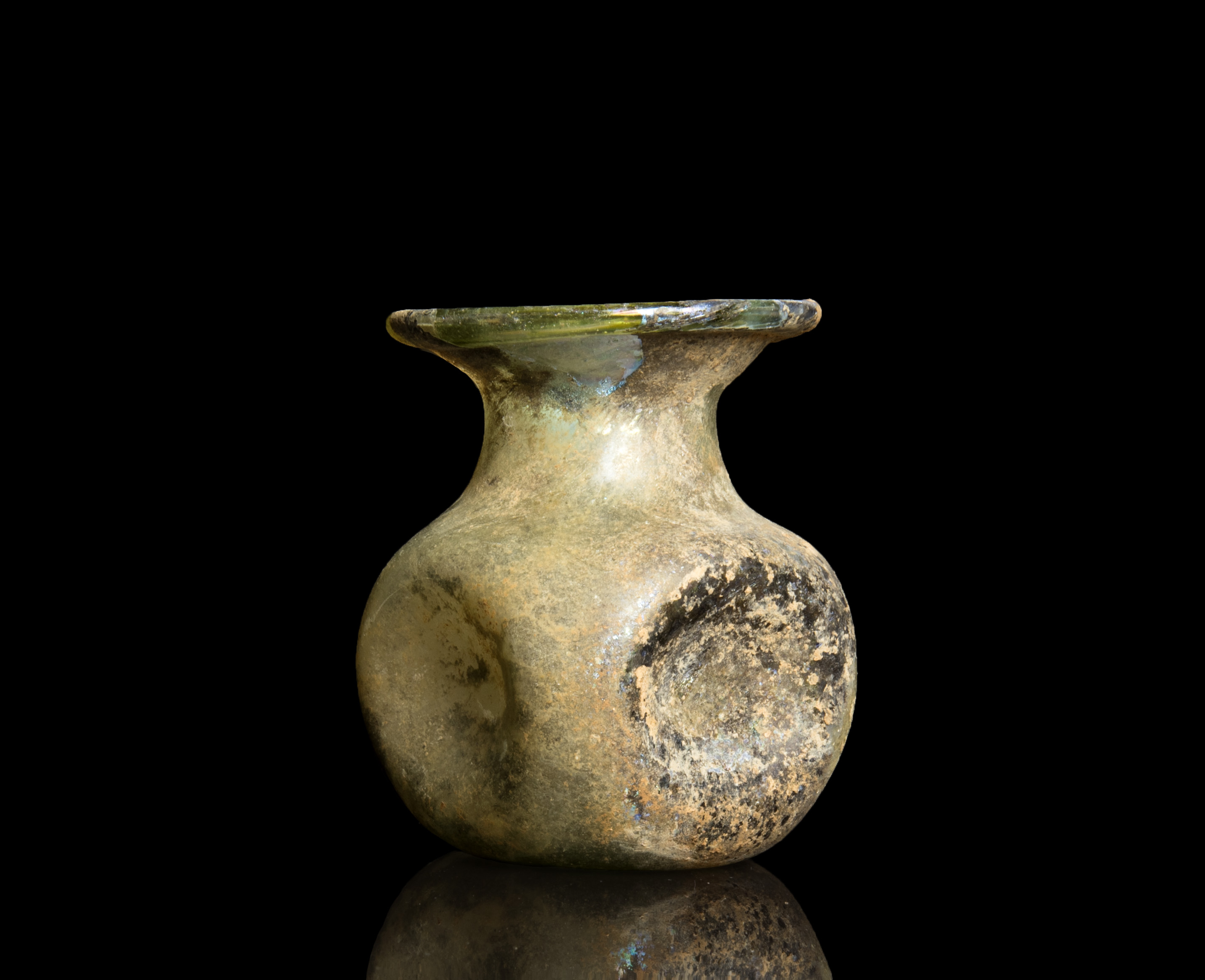 Roman glass jar with indented sides Antiquities